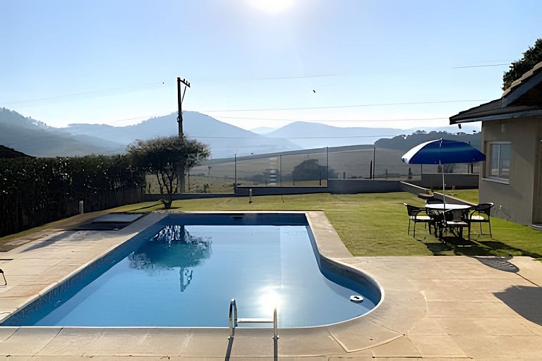 Refúgio com piscina, lareira e conforto – 1h de SP